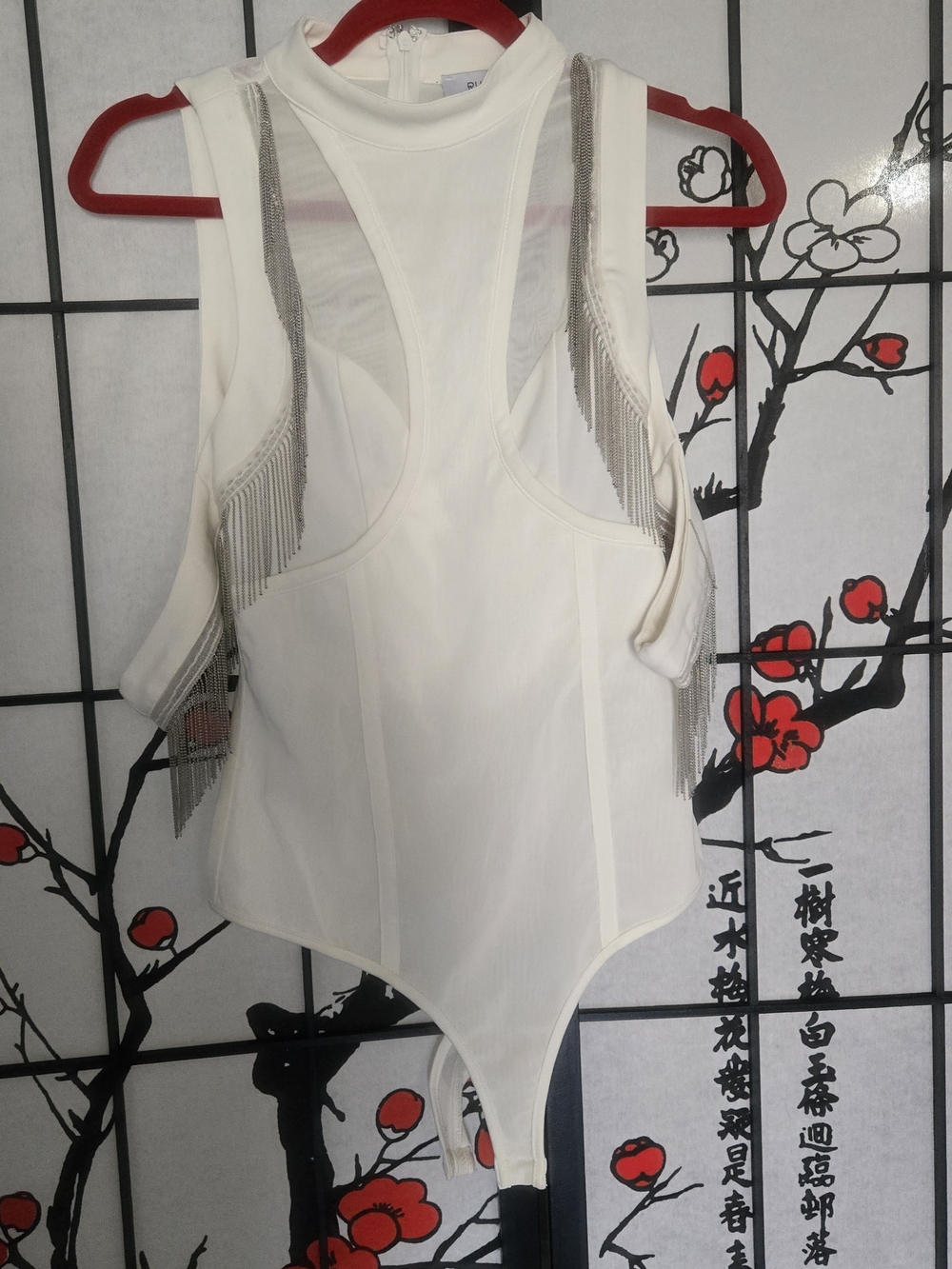 Sleeveless White Fringe-Trim Bodysuit with High Neck